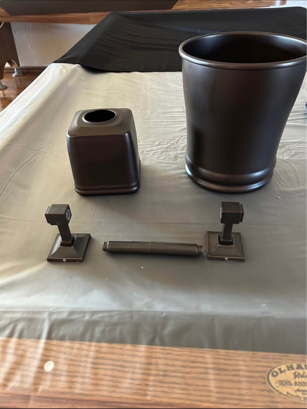 Restoration Hardware toilet paper holder with other accessories.